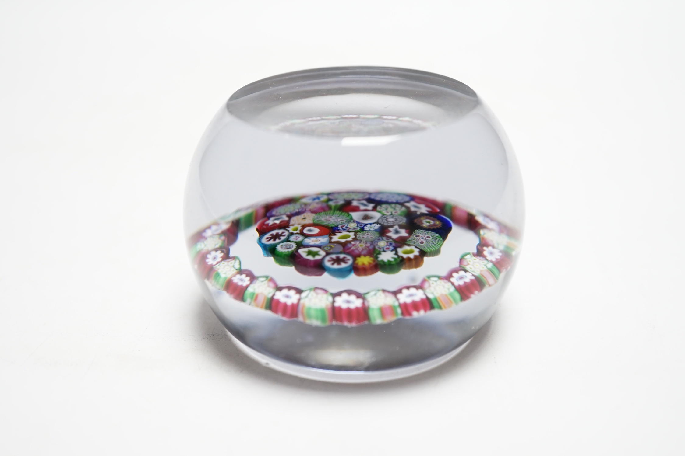 A Paul Ysart concentric millefiori garland glass paperweight, Harland period, ‘PY’ cane, 7.5cm